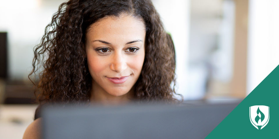 female looking at a monitor