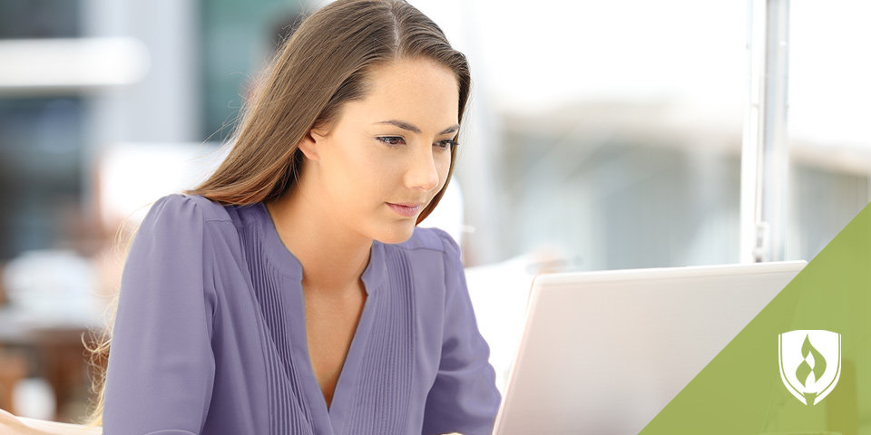 young female working on laptop