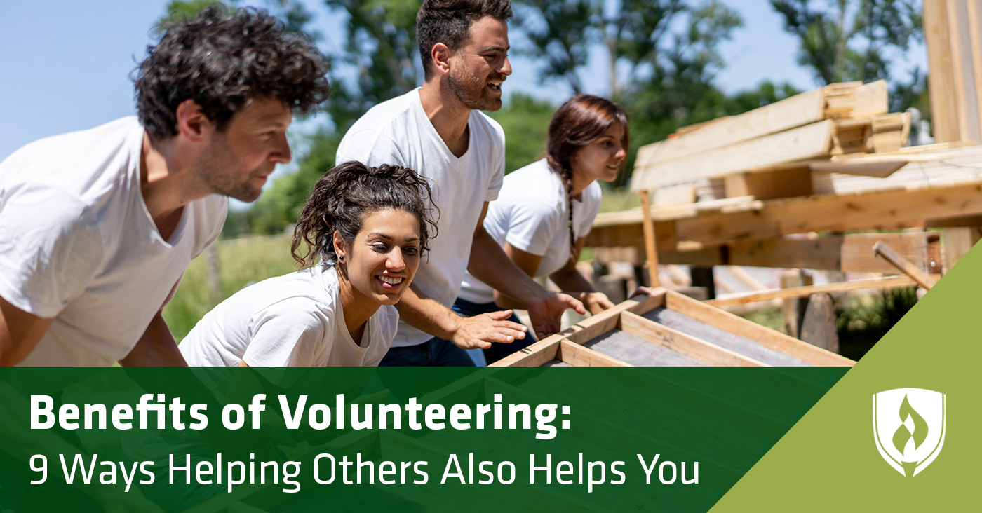 group of volunteers building house