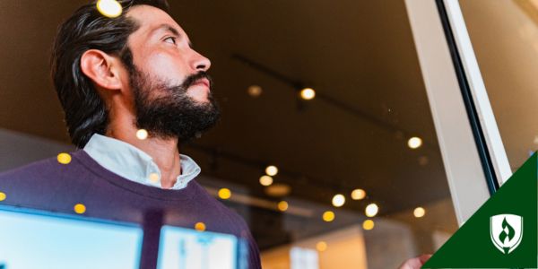 An adult student looks out the window
