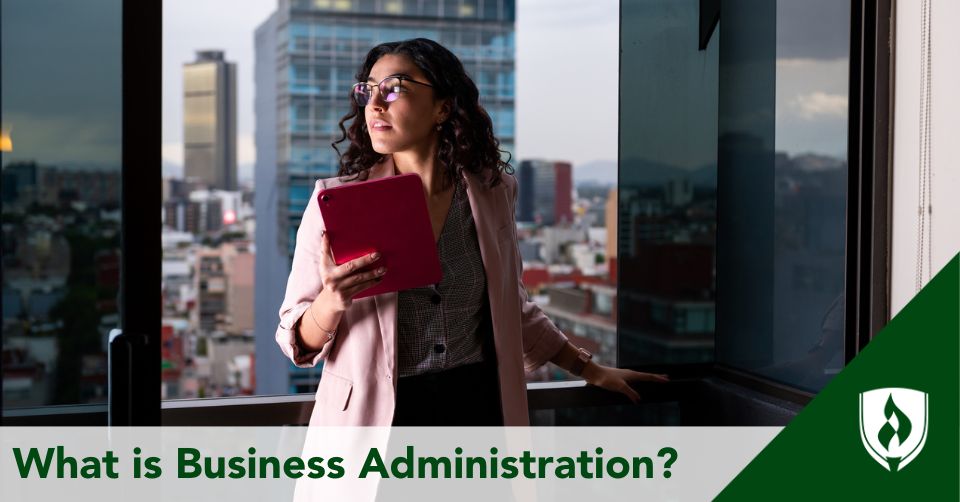 A business administration professional looks out over a city skyline