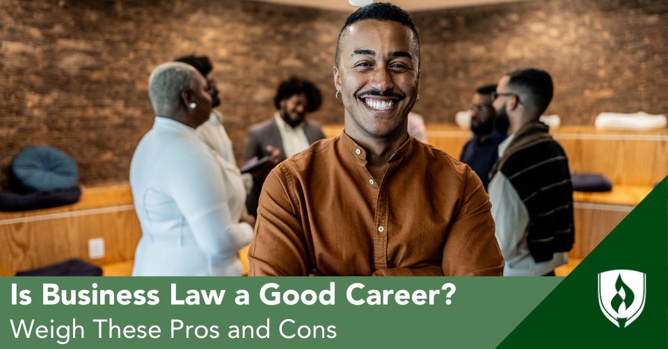 A Business Lawyer stands in front of a meeting