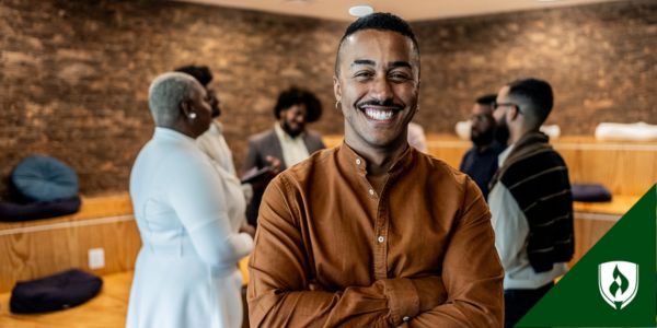 A Business Lawyer stands in front of a meeting