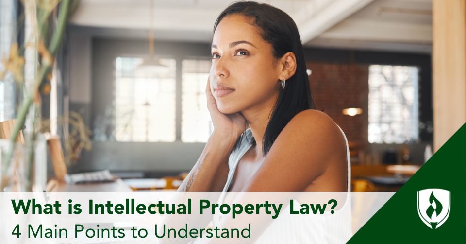 A business professional ponders by her computer