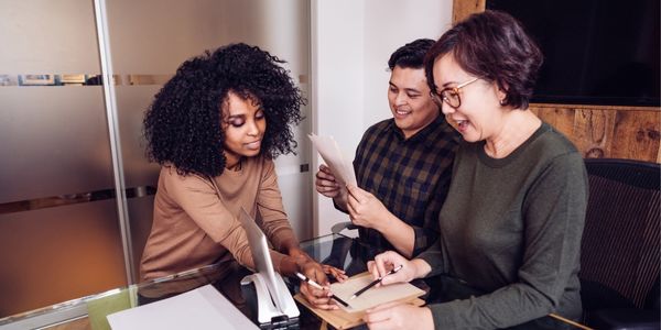 three people discussing human capital vs human resources