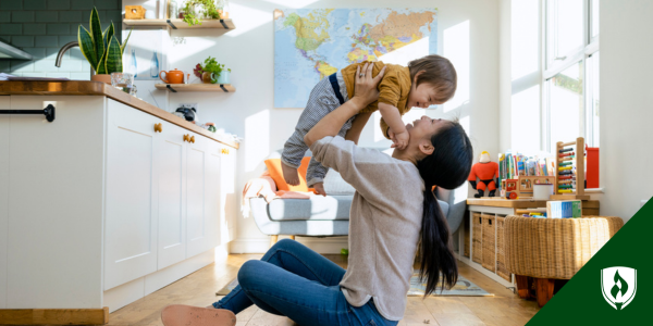 An early childhood professional plays with an infant