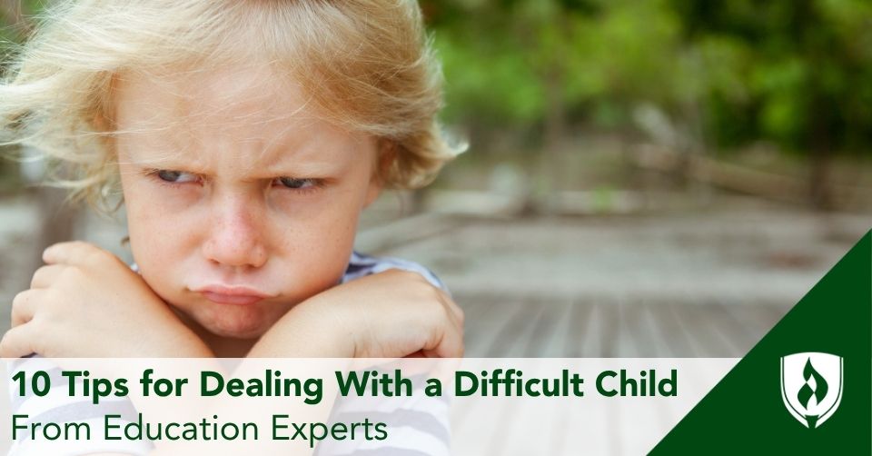 a frowning child with arms crossed