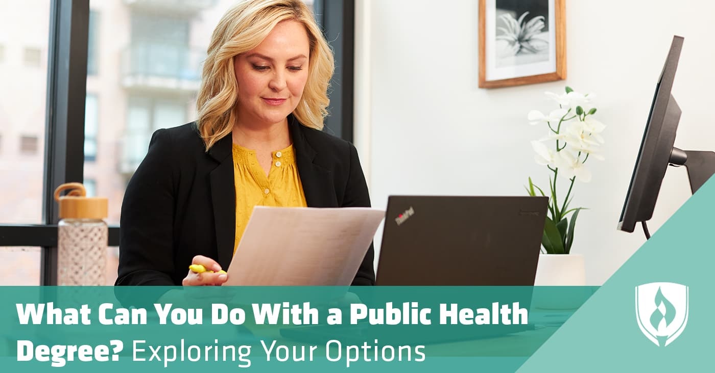 Photo of a public health professional working at a computer