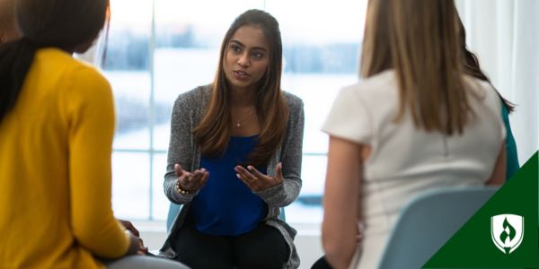 A child welfare specialist meets with a family