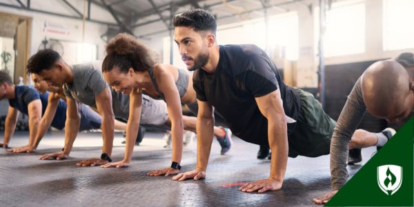 Police recruits do pushups during skills academy