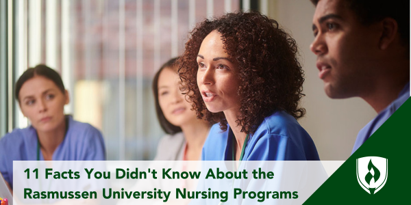 Four nursing students sit at a table, listening to a female nurse with curly brown hair