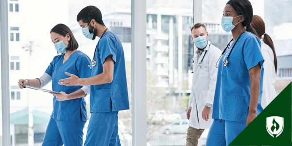 BSN nurses walk down the hall