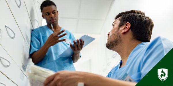 two male nurses grab inventory