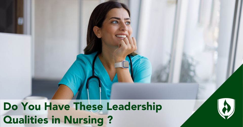 nursing leadership header A nurse smiles while sitting at a computer