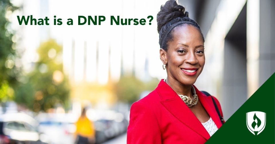 A DNP nurse in a red blazer smiles outside her hospital
