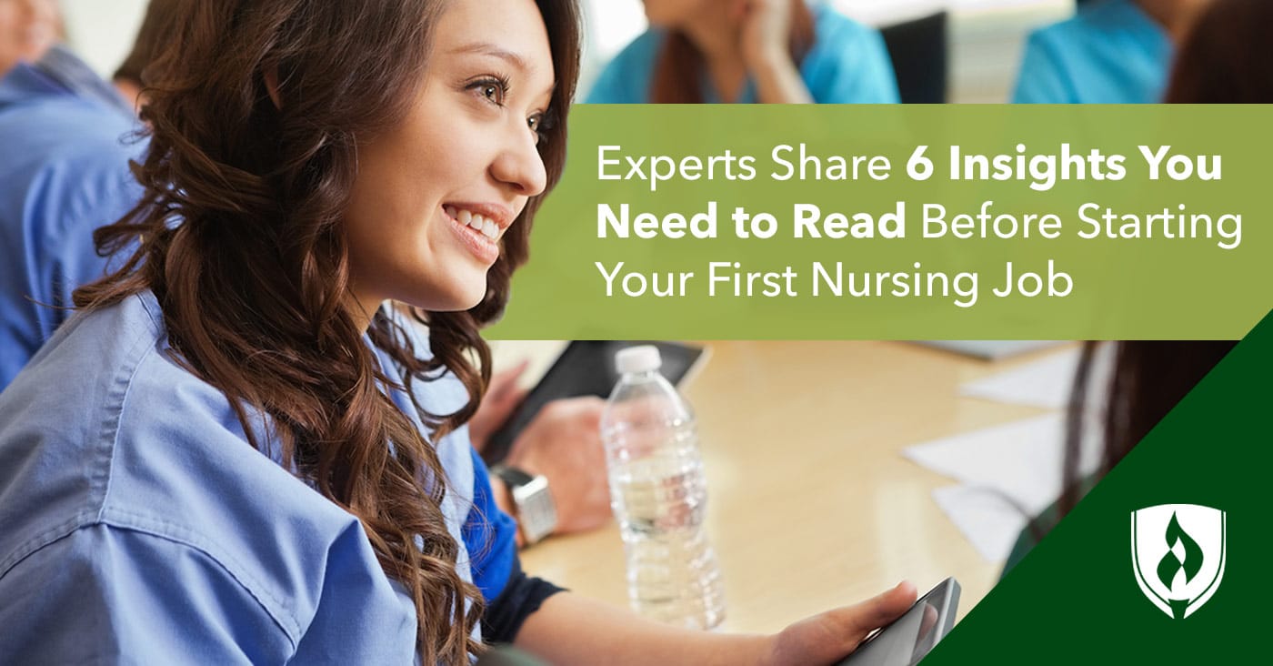 female nurse sitting at table talking to other nurses