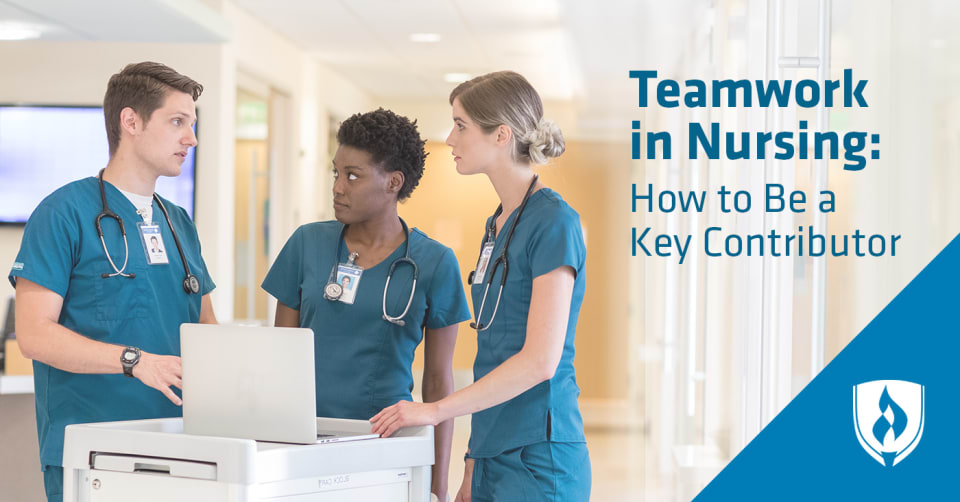 two female nurses and one male nurse talking over laptop