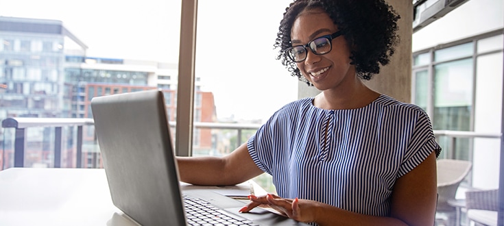 Business woman working on her computer