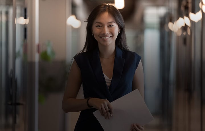 Female smiling in hallway mobile