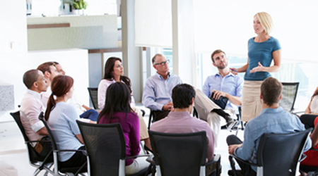 health and wellness professional talking to a group people