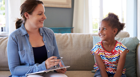 human services professional and young girl