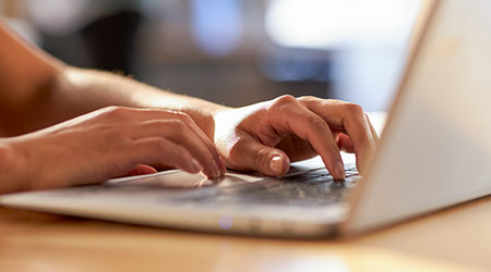 female working on laptop