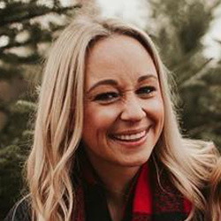 photo of a smiling nurse graduate